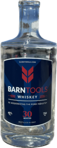 A Barn Tools Whiskey bottle - an example of our screen printed bottle printing services
