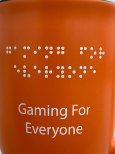 Close up photo of braille printed on a bottle
